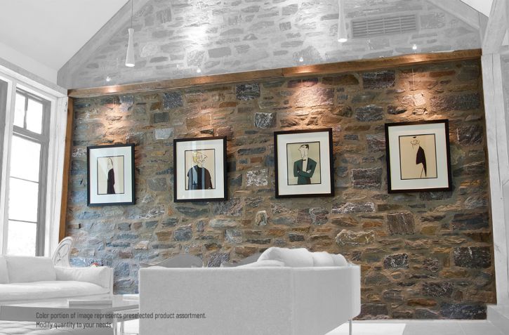 Track mounted in beam to hang art on stone wall