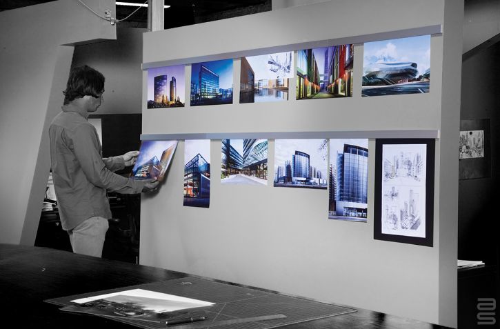 Ergonomic display rail system for a creative office space