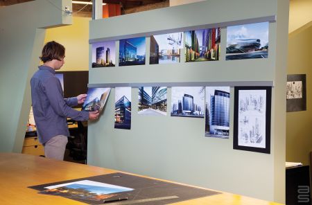 Ergonomic display rail system for a creative office space