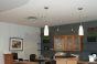 Plexiglass panels suspended by Fixed Piers Signage Kit in a reception desk.