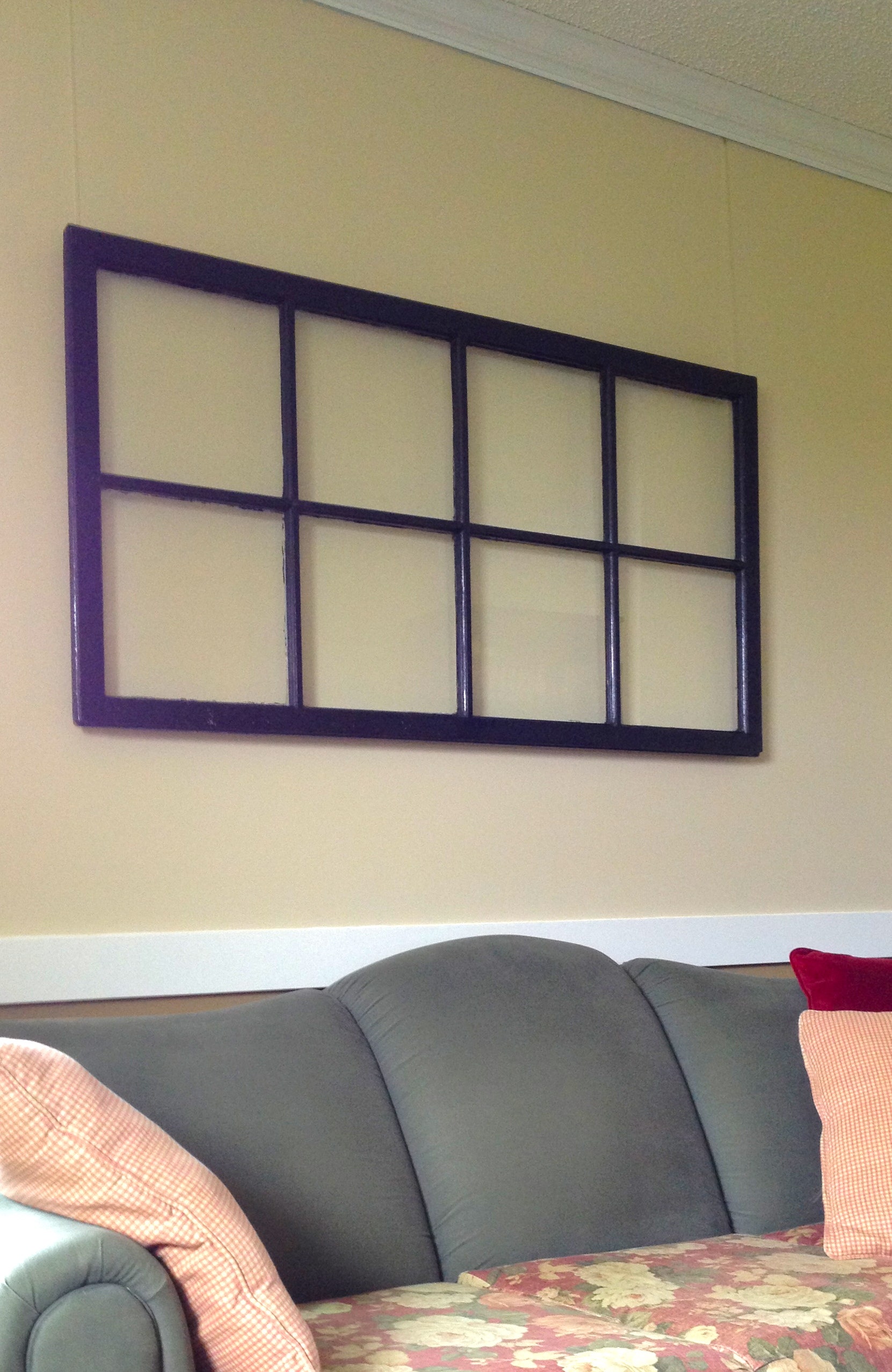 Bumpers by AS Hanging Systems are added to storm window to create a floating effect.