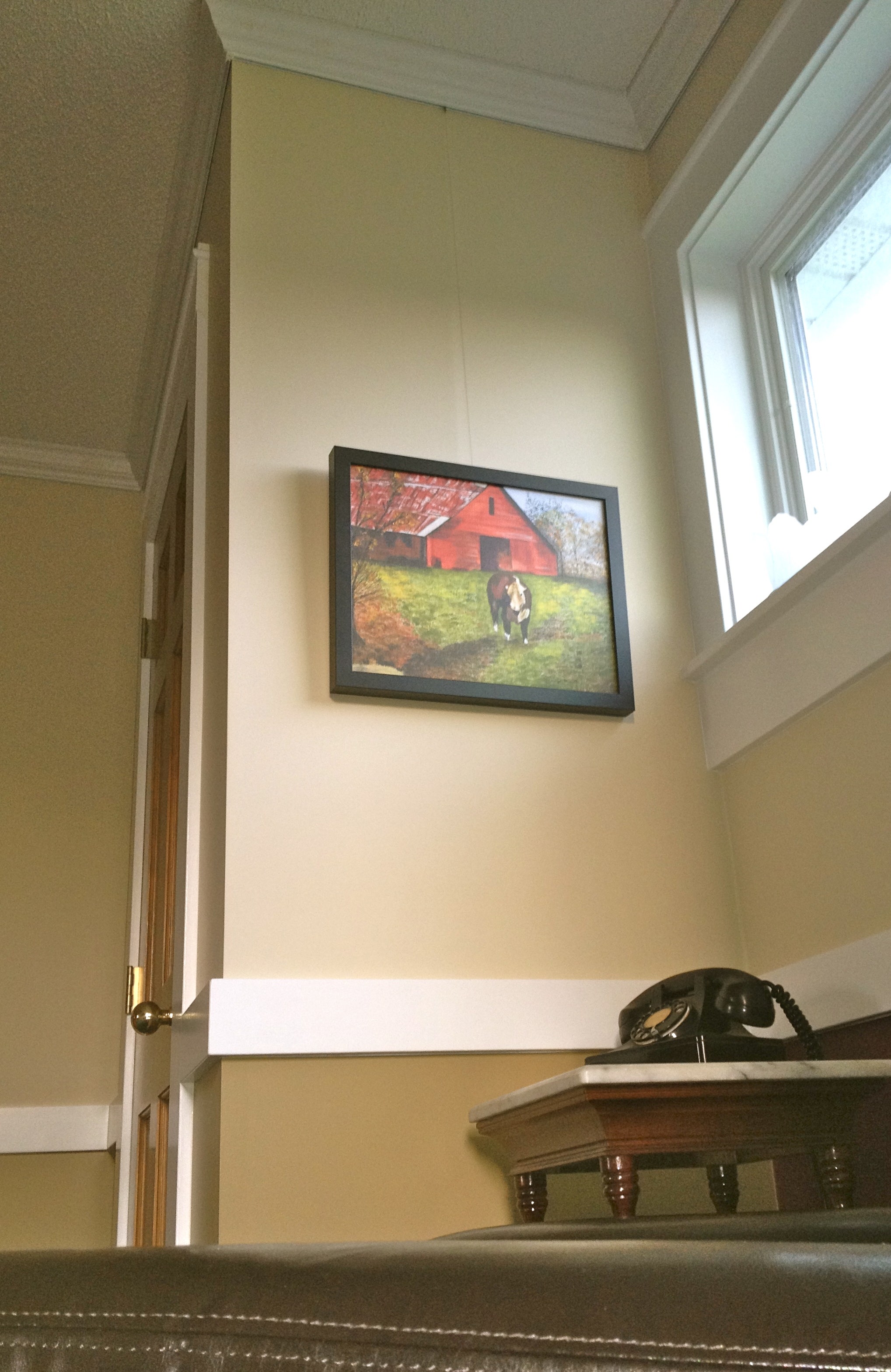 Farm photo hanging from Click Rail Track by AS Hanging Systems 