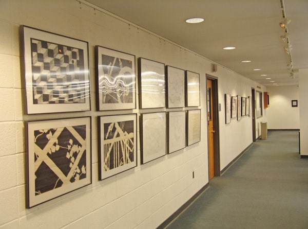 Collegiate art department art display using Click Rail System by AS Hanging Systems.
