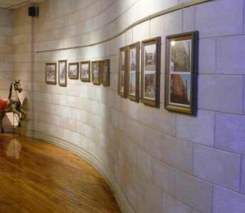 Contempo System by AS Hanging Systems on Curved Masonry Wall.