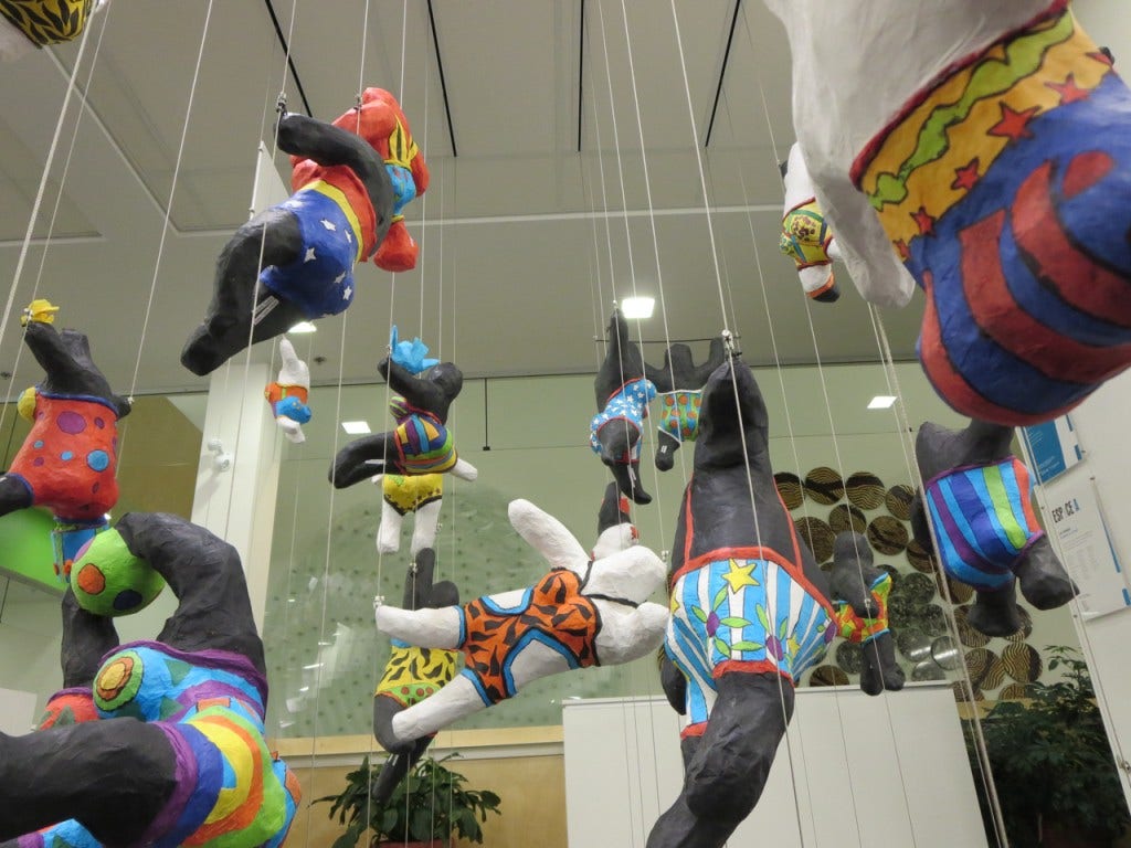 3D art suspended mid-air along cables using Mini Hooks.
