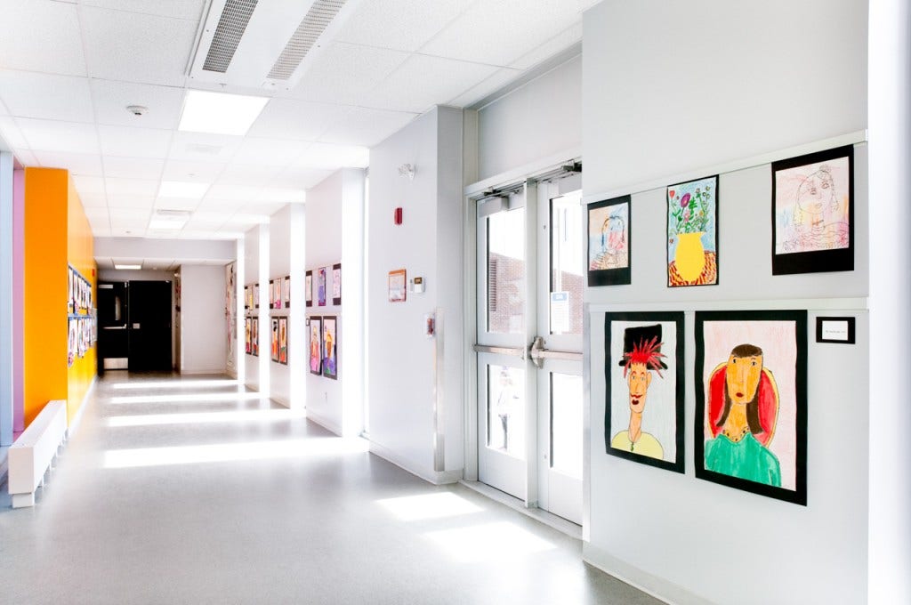 Casso® Display Rail creates safe school art display.