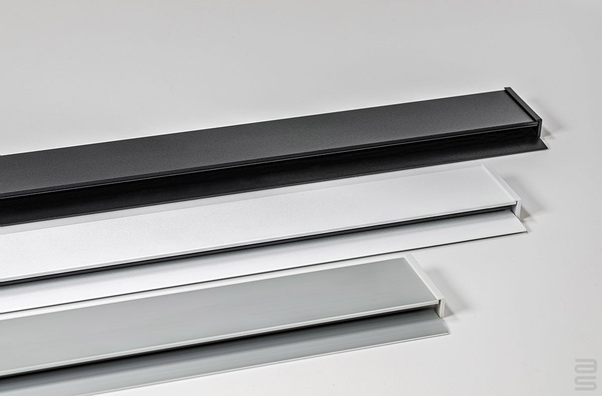 Three colors of Casso Display Rails: black, cool white and silver satin.